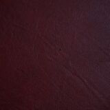 Danish sculpted oak stool from the mid-20th century with a red leather seat, 1950s.