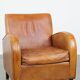 Characteristic sheepskin design armchair in beautiful warm cognac colours
