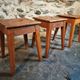 Set of 3 vintage French wooden stools from the 1950s.