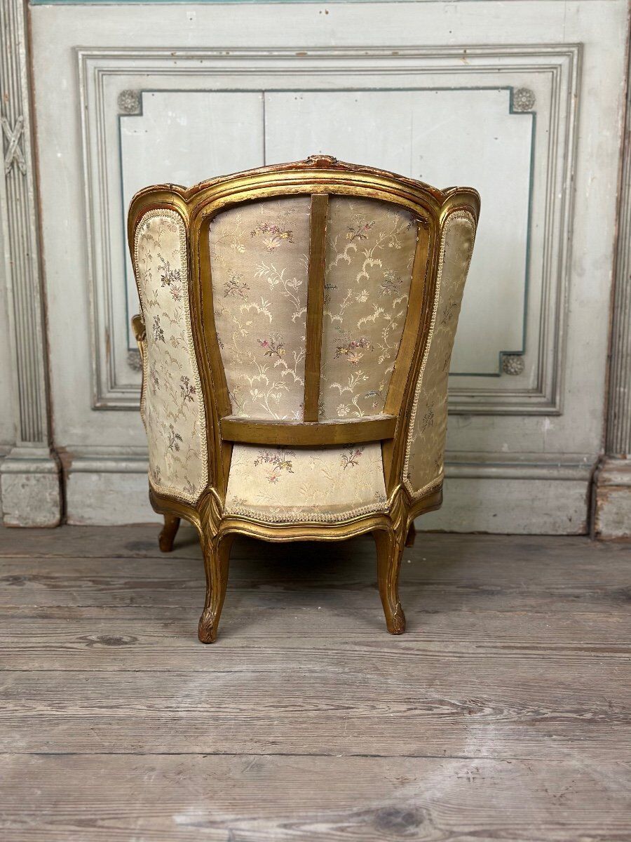 A Louis XV style child's bergère chair in carved and gilded wood, circa 1880