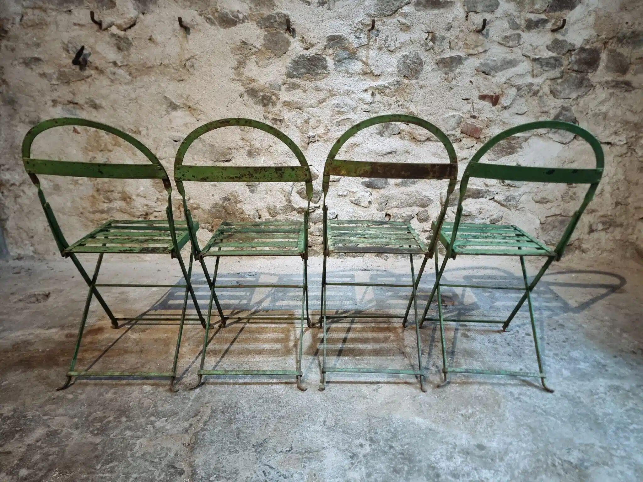 Set of 4 Antique Iron Folding Garden Chairs - 1920s Riveted Bistro Chairs with Aged Green Patina