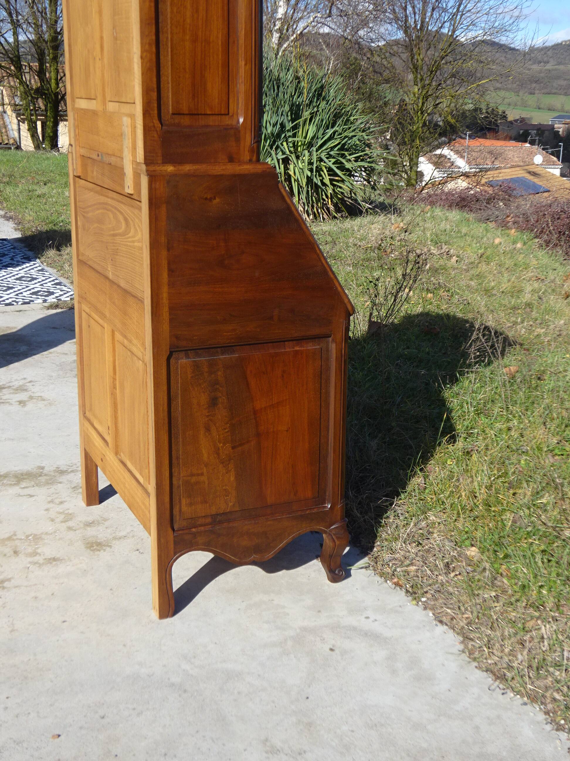 3-in-1 furniture: chest of drawers, secretary, and display cabinet, in walnut.
