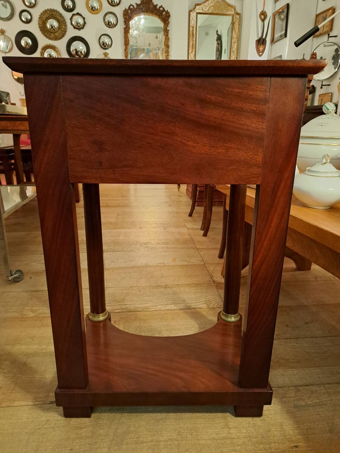 Empire style bedside table in mahogany and bronze