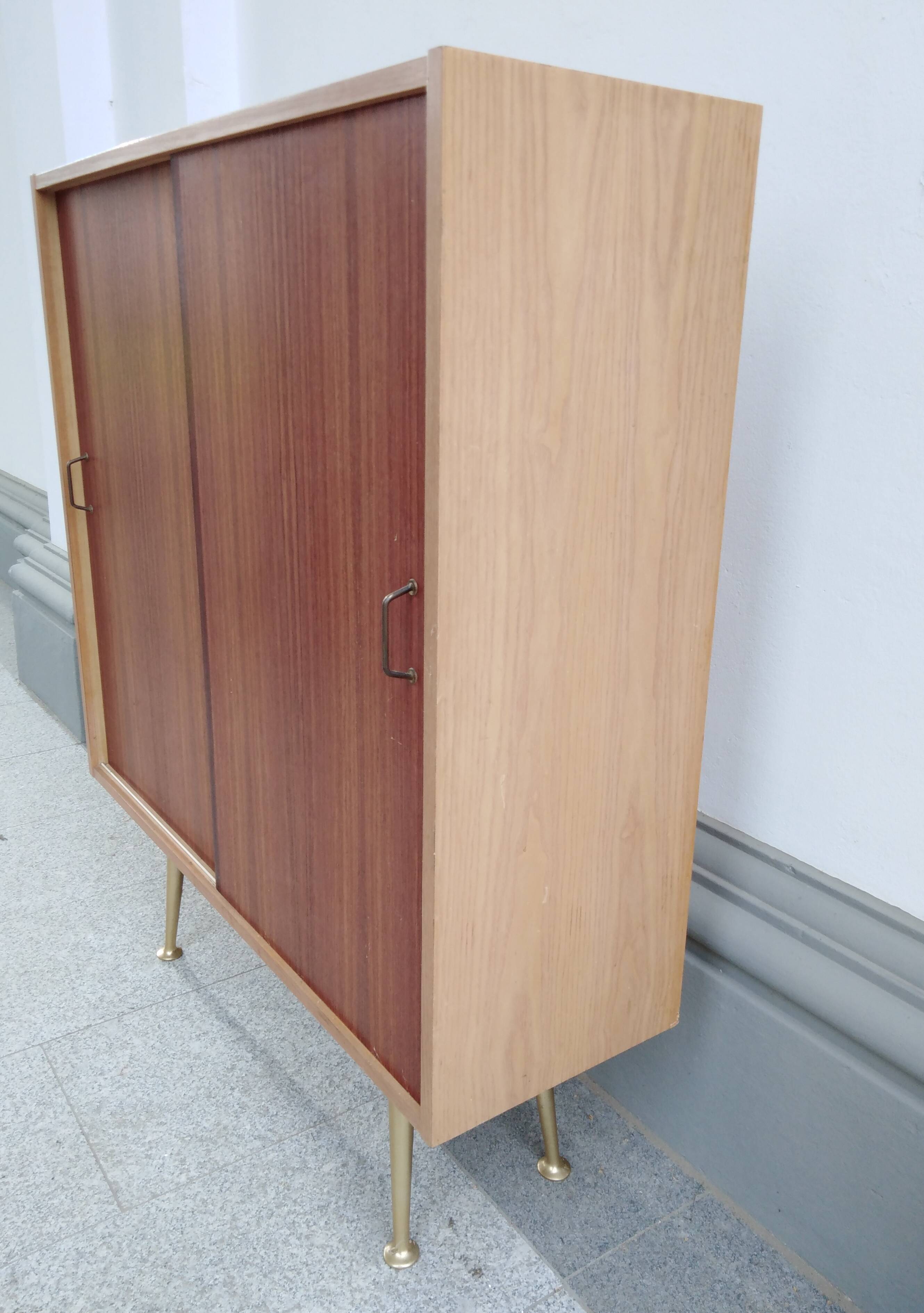 Mid Century cabinet with brass legs
