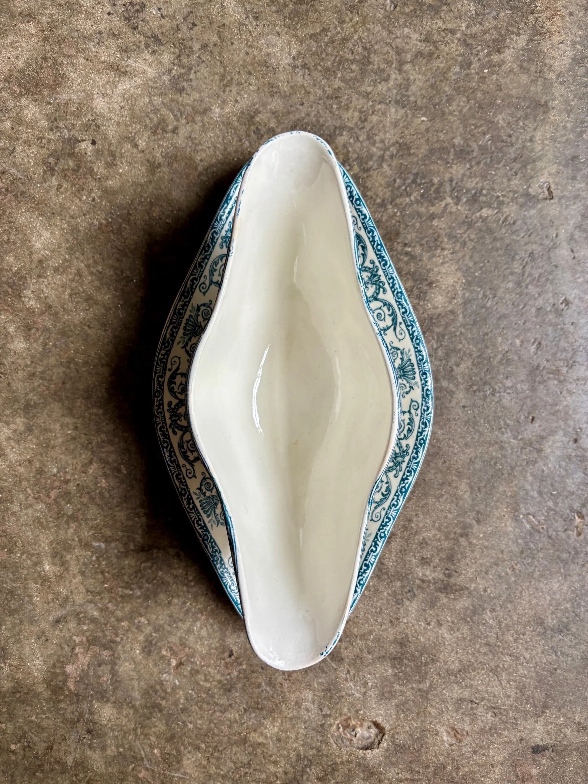 Léon Graves sauce boat in ironstone, "Marie-Louise" service.