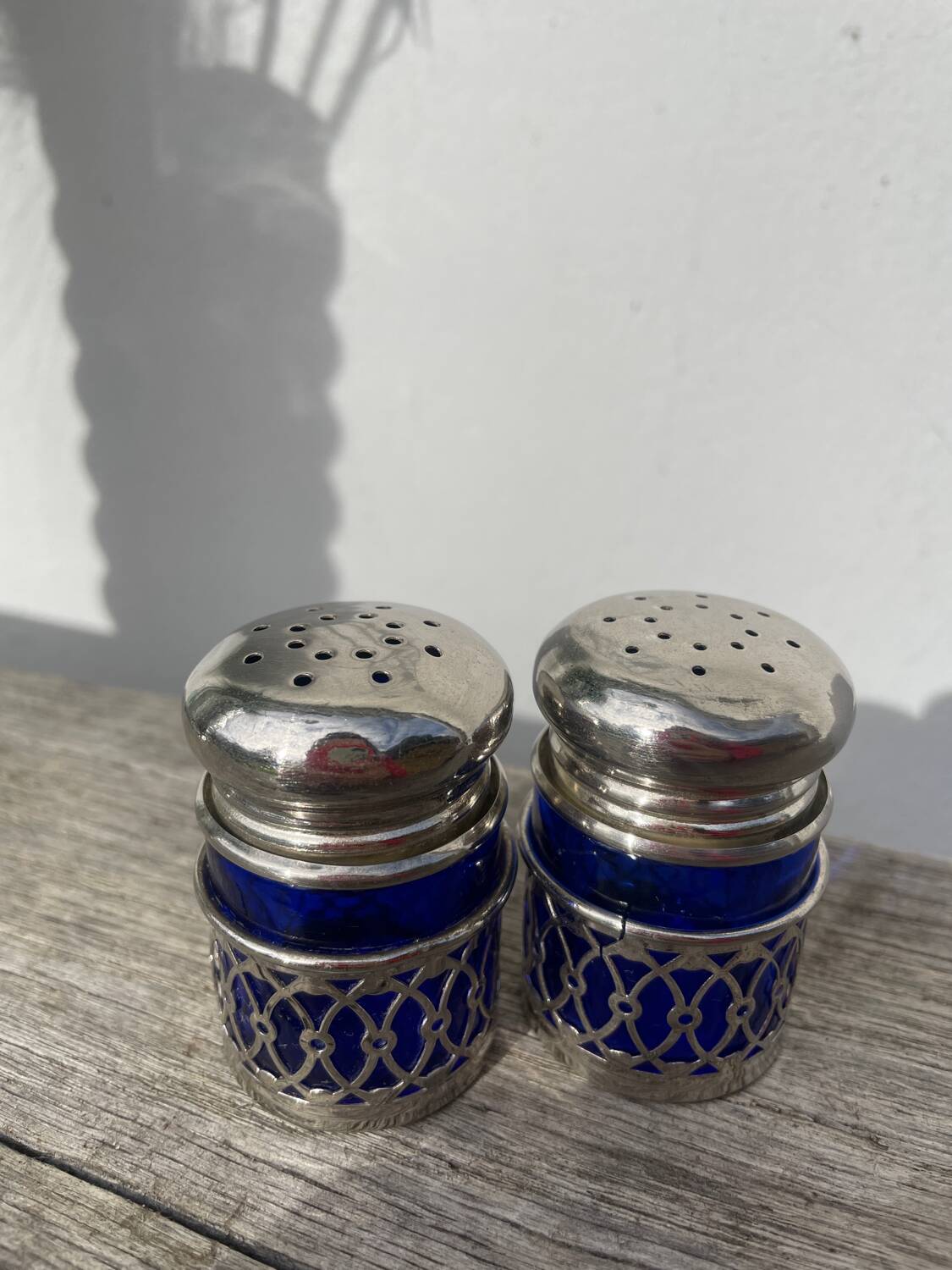 Silver-plated metal and blue glass salt and pepper shaker