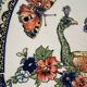 Grand plat à décor de Paons et fleurs XX siècle