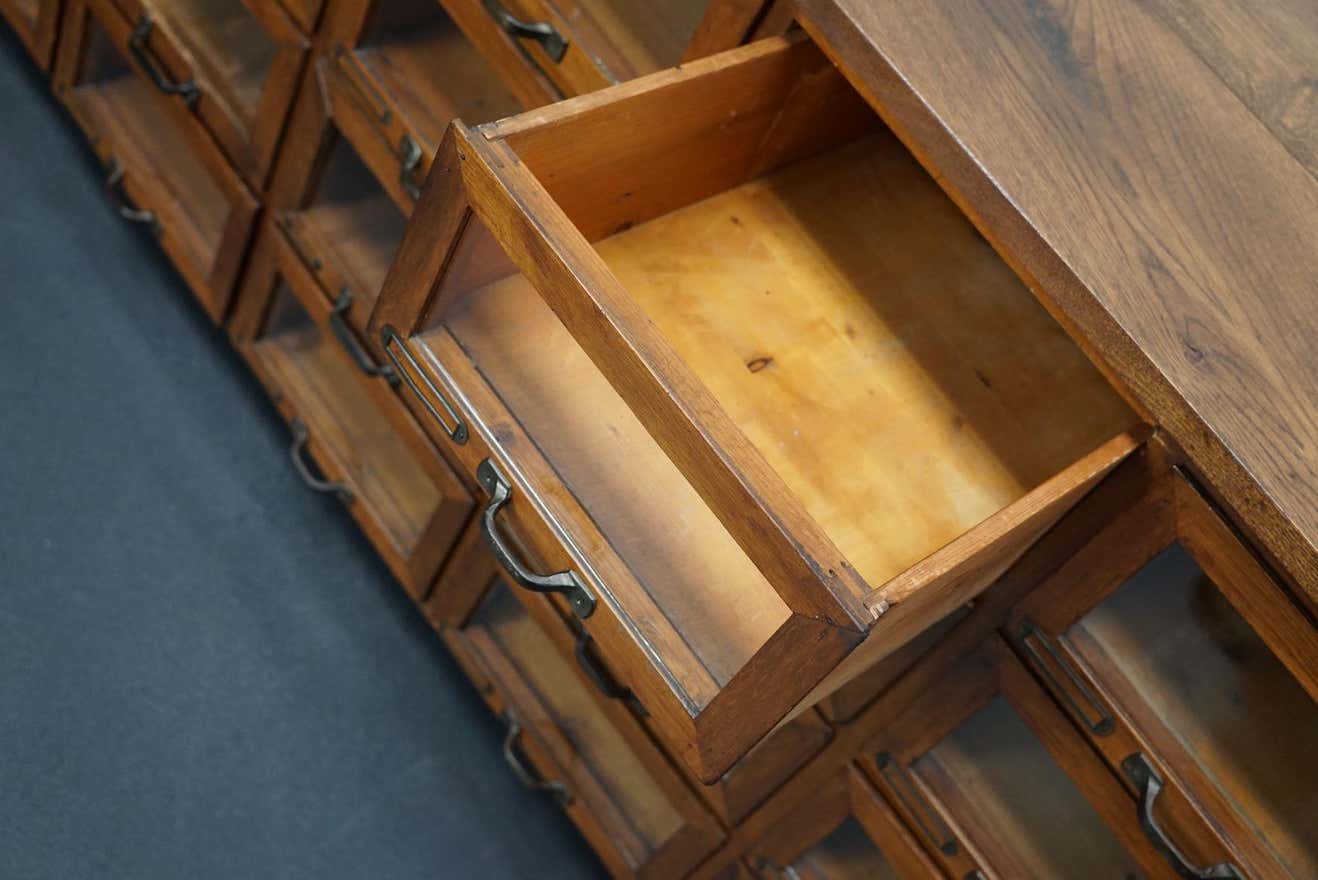 Vintage dutch oak haberdashery cabinet 1930s