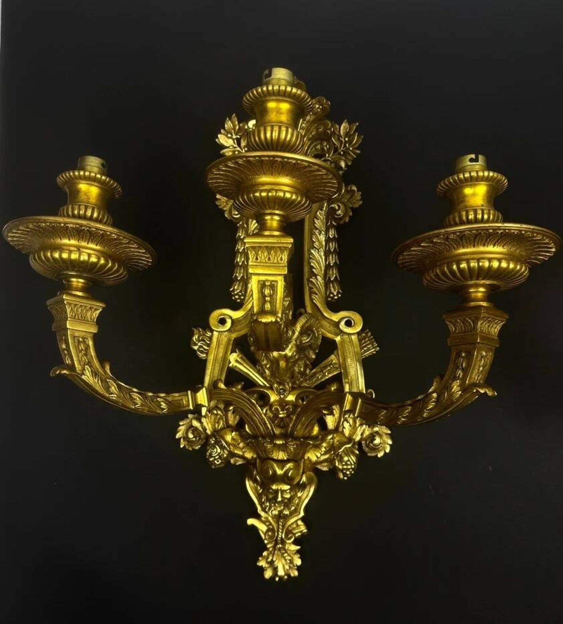 A pair of important gilt bronze wall sconces, Louis XVI style, 19th century.