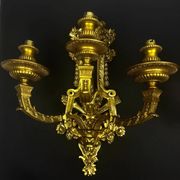 A pair of important gilt bronze wall sconces, Louis XVI style, 19th century.