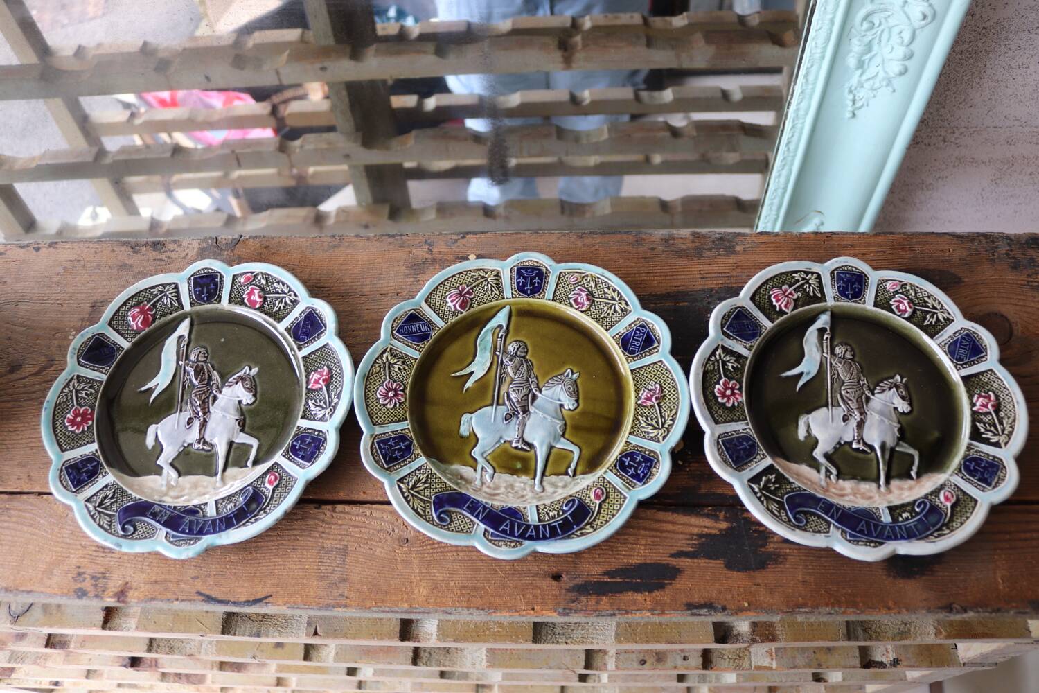 3 antique barbotine plates featuring Joan of Arc "En Avant"