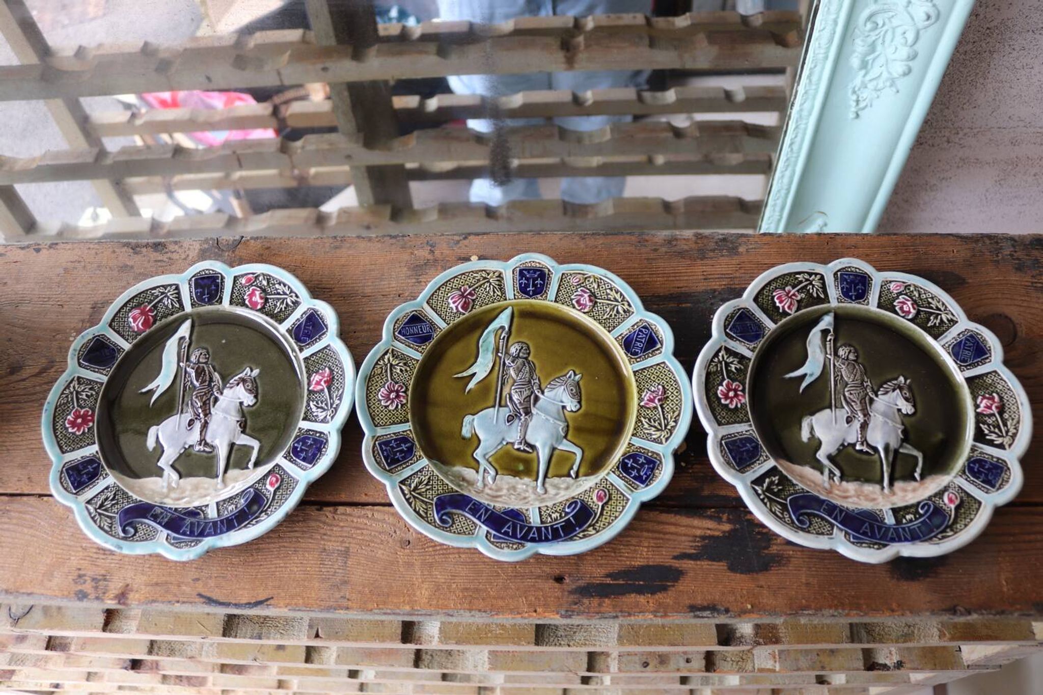 3 antique barbotine plates featuring Joan of Arc "En Avant"