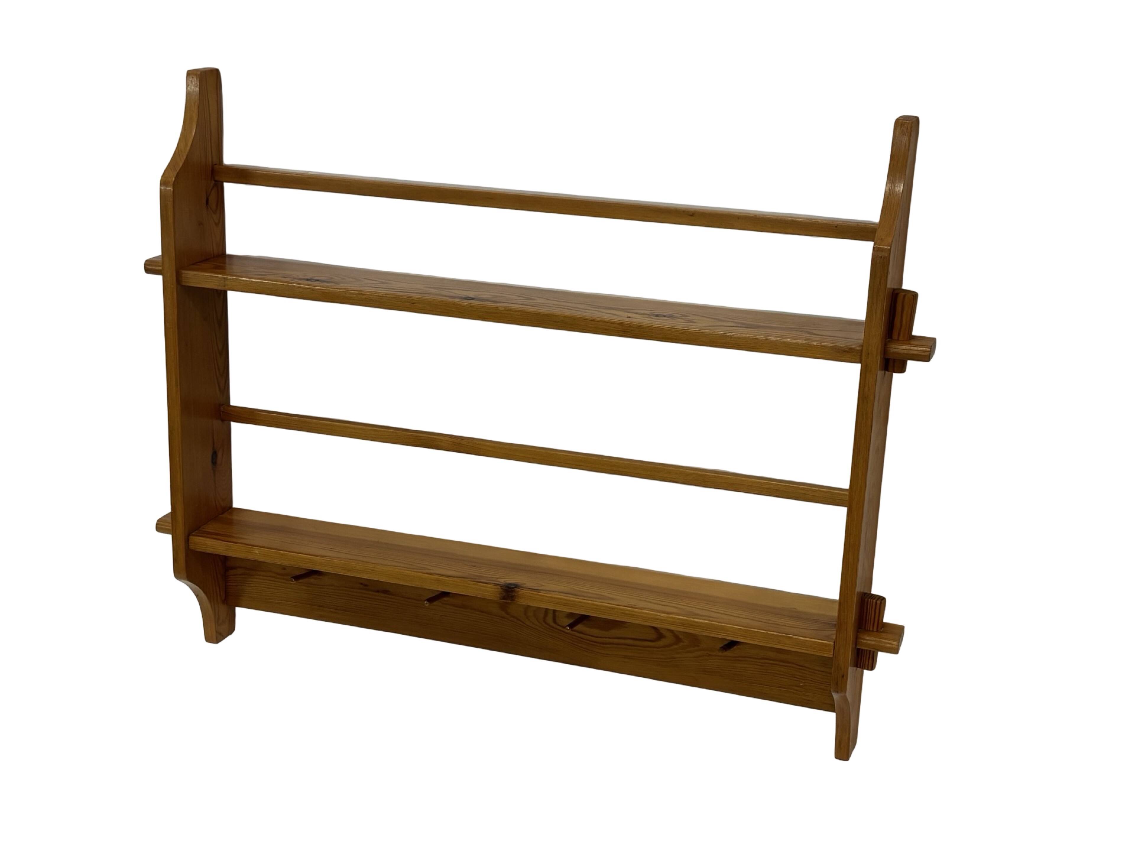 Vintage wooden wall shelve rack bookshelf in pinewood minimalist design