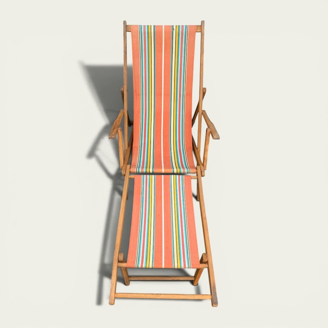 Vintage striped multicoloured deck chair with original patina.