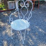 Ancien fauteuil de jardin en fer forgé