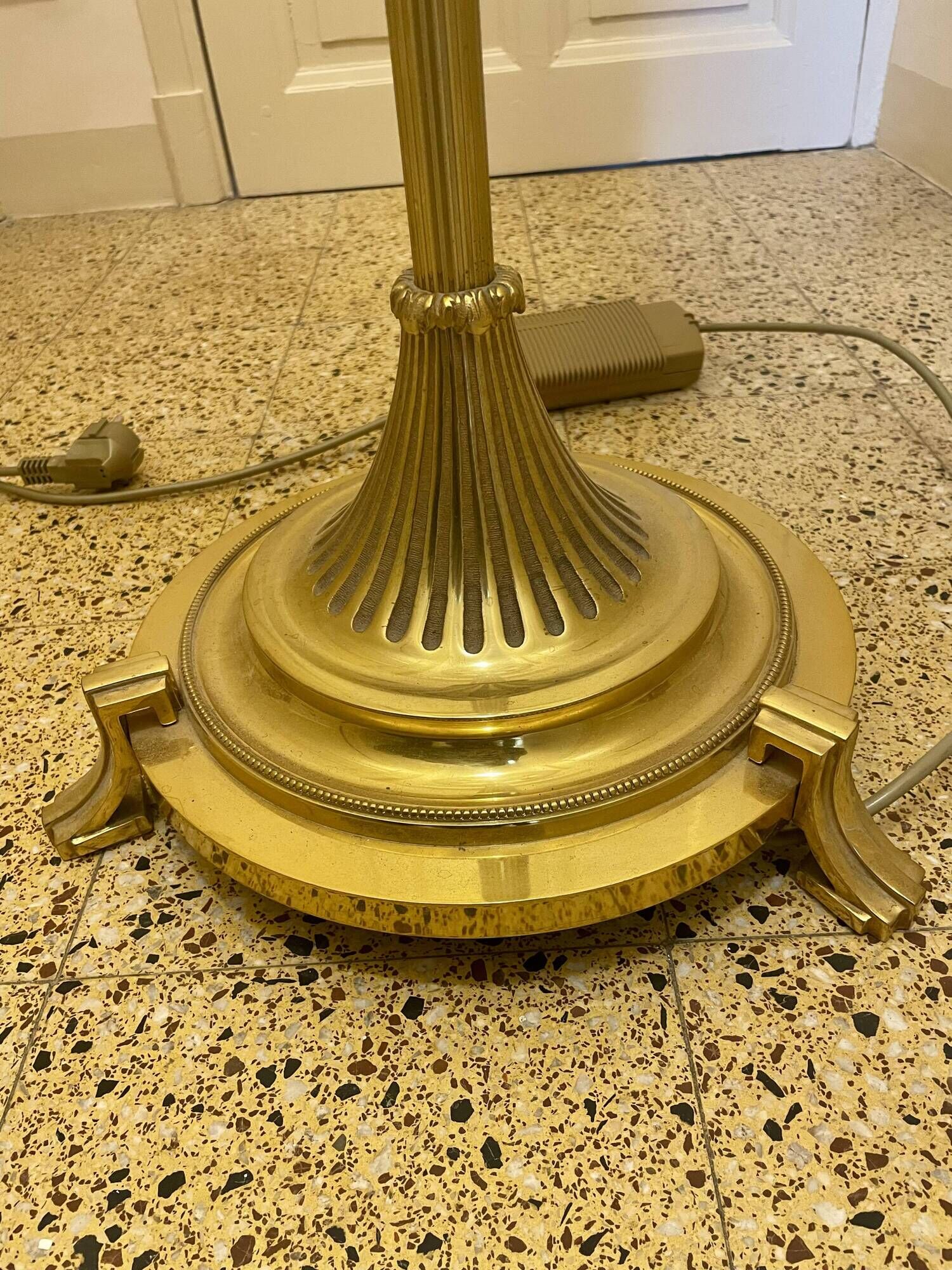 Bronze floor lamp by Lucien Gau, with a six-light shade model 16136.