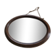 Old oval mirror with wooden frame