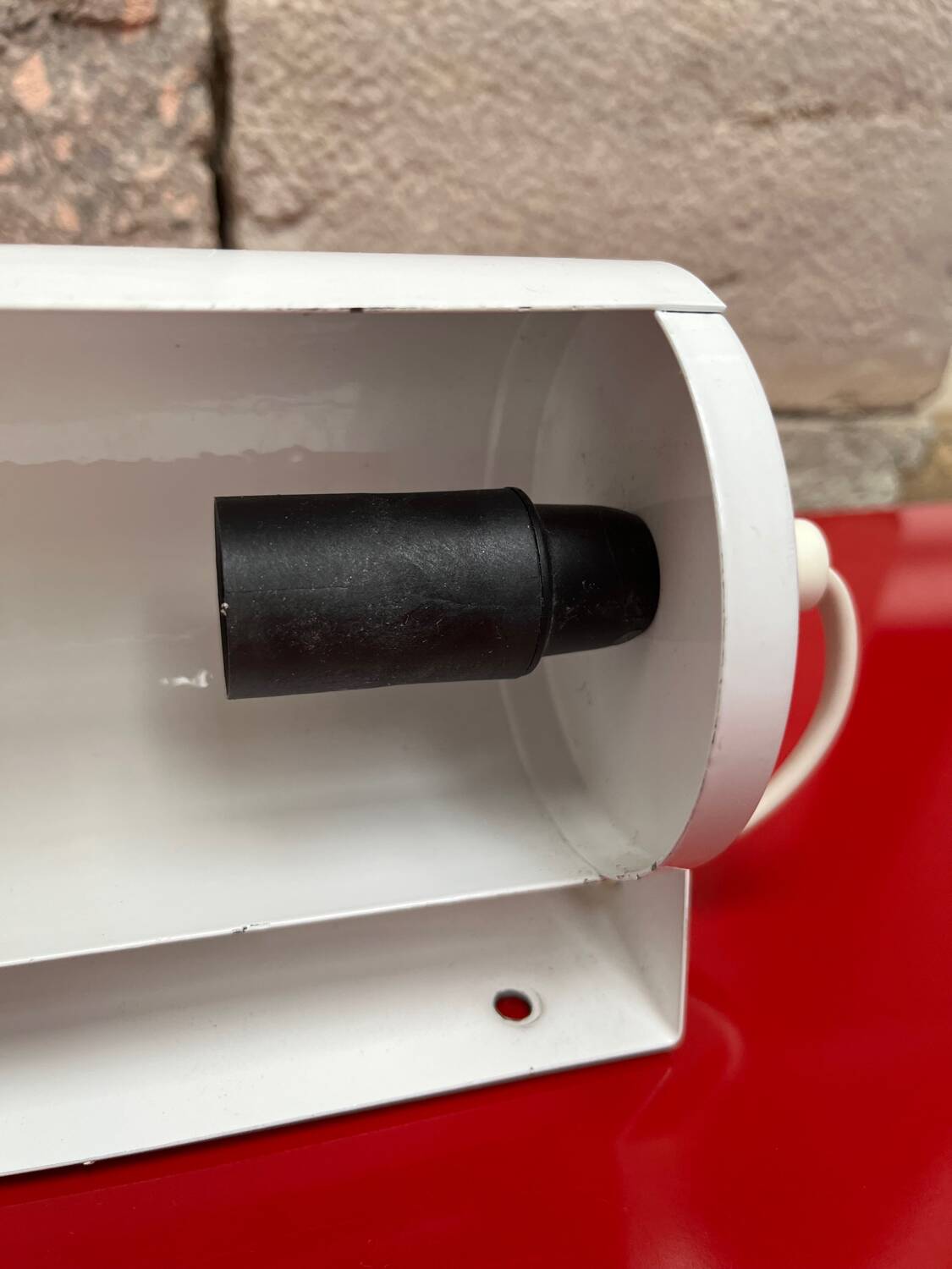 Metal wall light with shutter