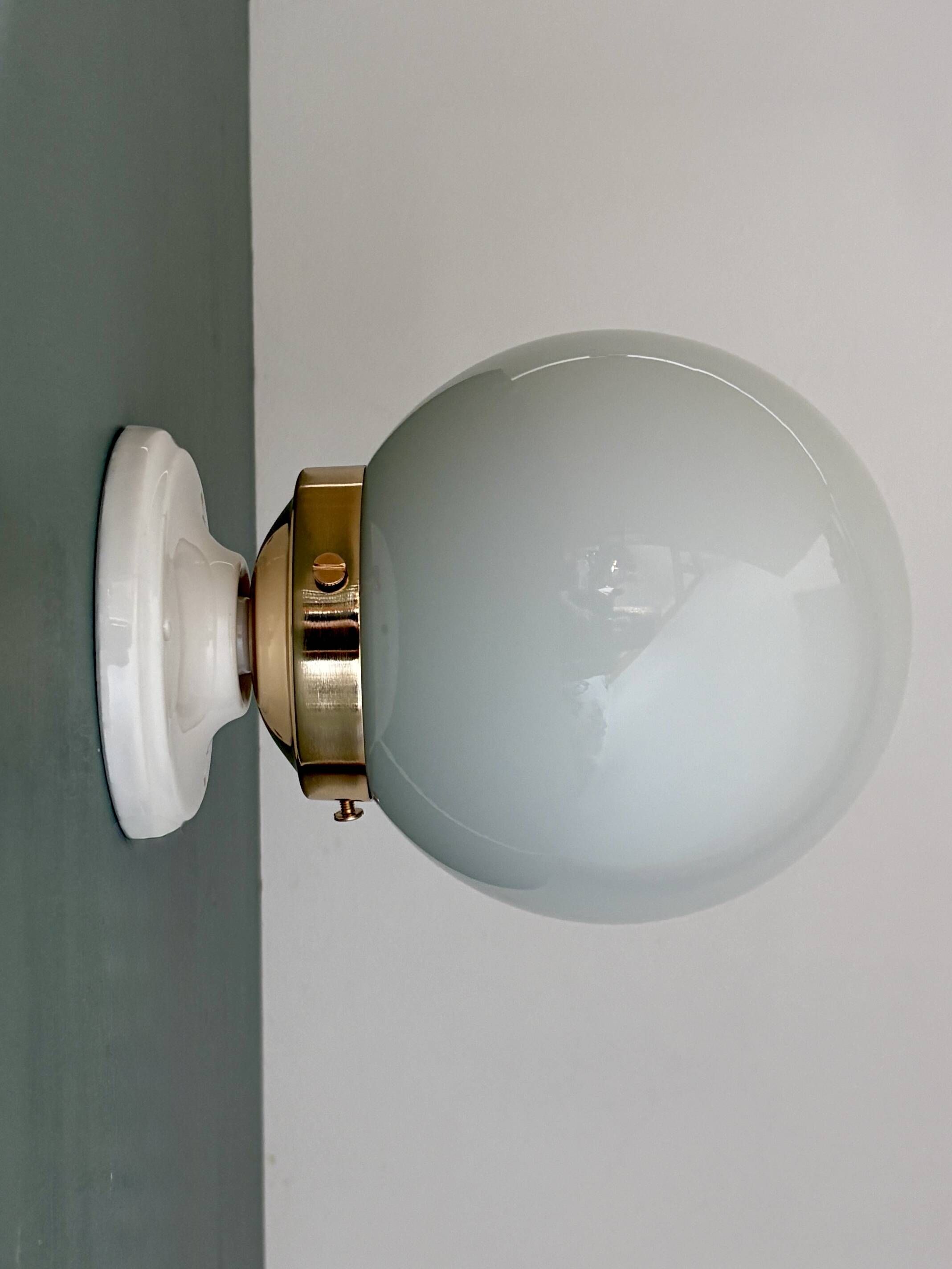 Vintage globe wall or ceiling light in white opaline.