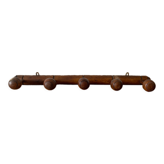 Old wooden wall coat rack