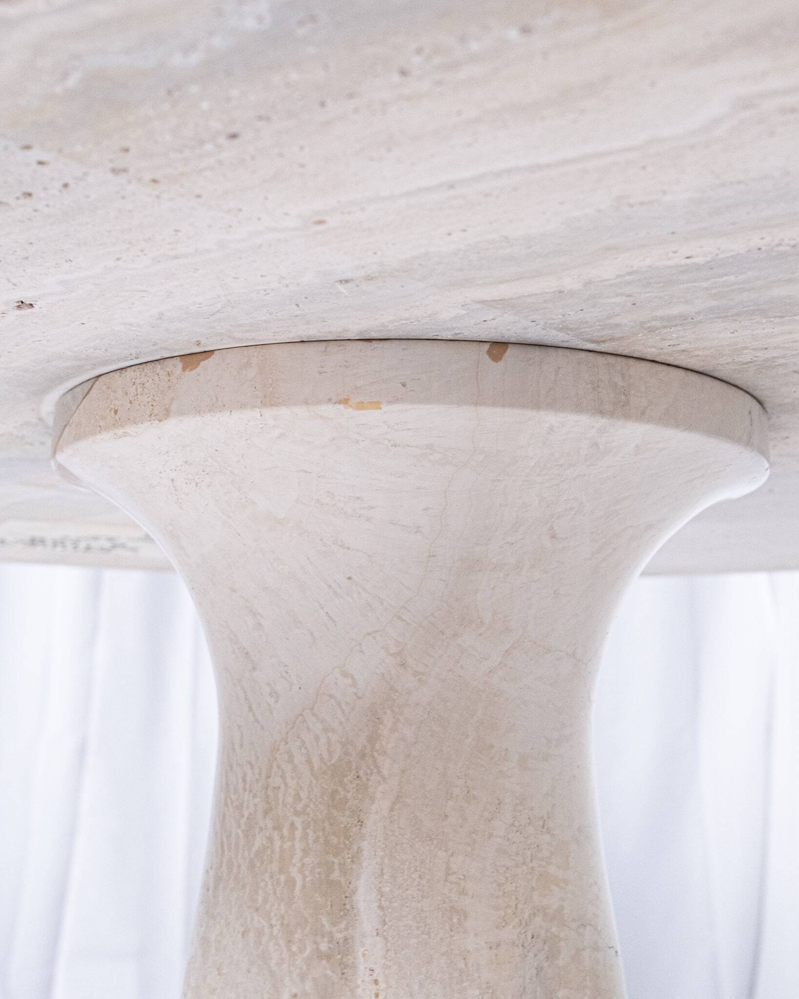 Pedestal dining table in travertine, Stone International, Italy, 1970s