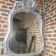 Louis xv style mirror with silver patinated shell