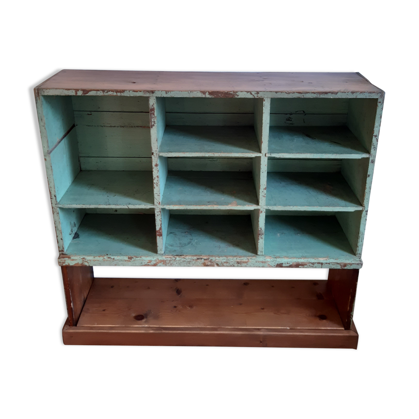 Old library shelf in patinated grocery tree