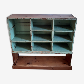 Old library shelf in patinated grocery tree