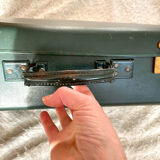 Dark green vintage cardboard suitcase