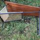 Table basse teck avec porte revue années 60