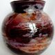 Lacquered glass ball vase by Jean Noel Bouillet