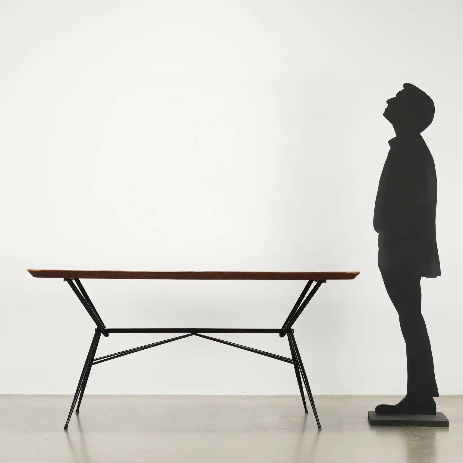 1960s vintage table made of wood and metal with a glass top, Italy.