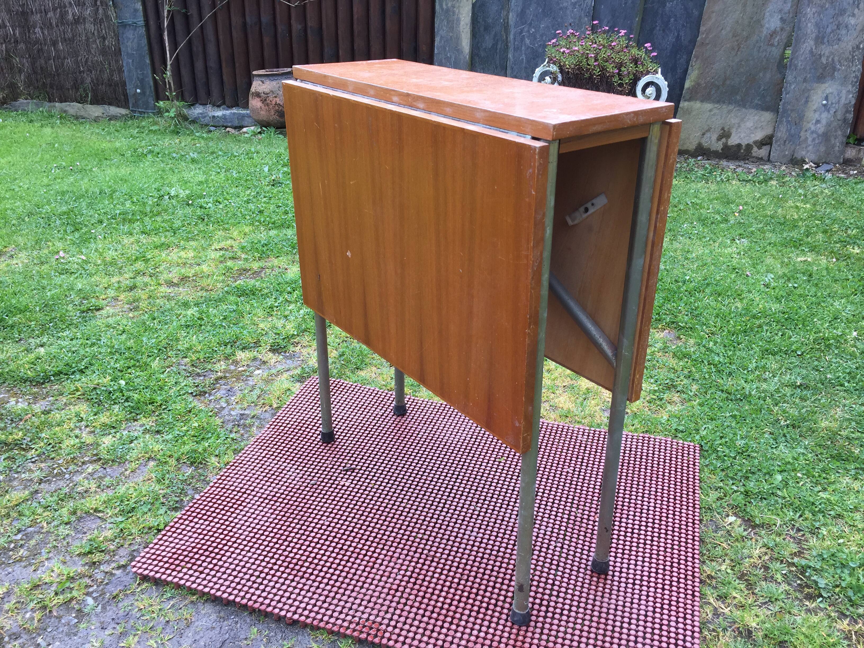 Vintage folding table with teak flaps said wallet with metal tubular base