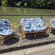Rattan lounge with two armchairs and a vintage 1950s bench.