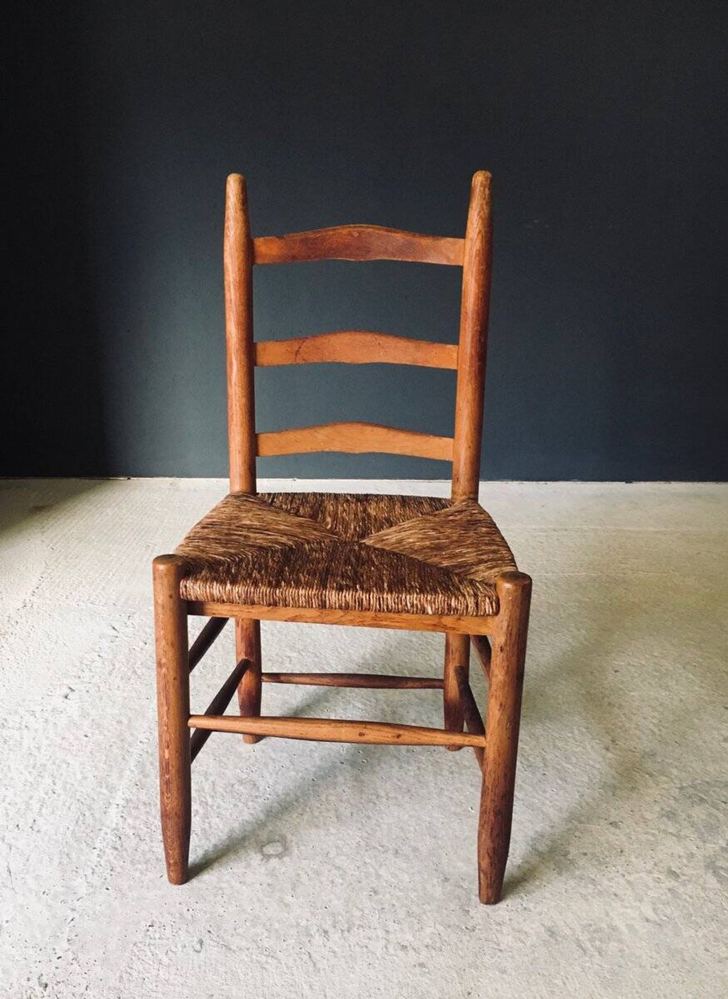 Low rustic ladder back dining chairs in oak and rush, Belgium, 1950s, set of 6.