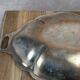 Antique oval silver-plated copper tray with handles.