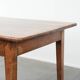 French dining table made of fruitwood from the early 19th century