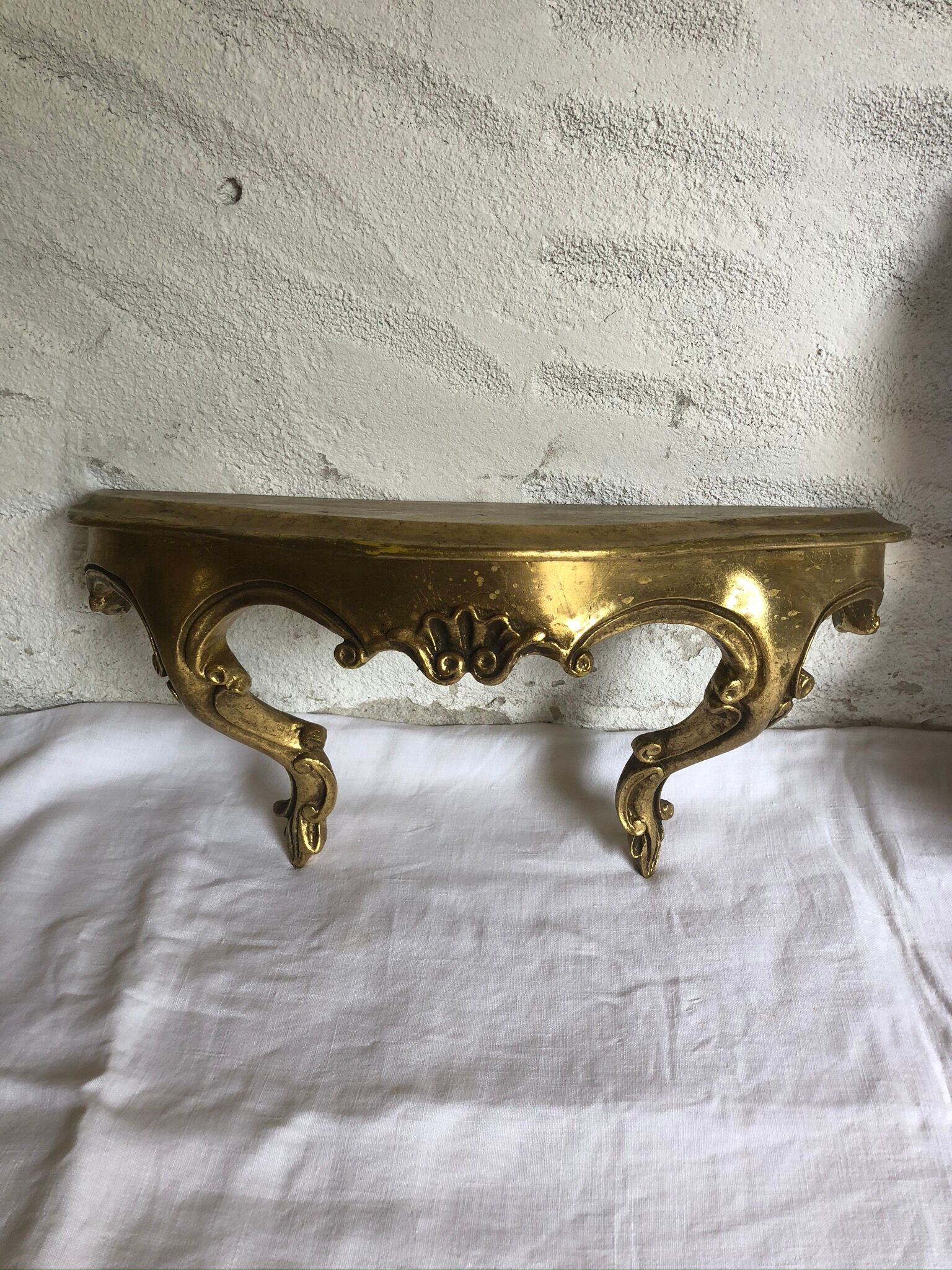 Old golden mirror and console