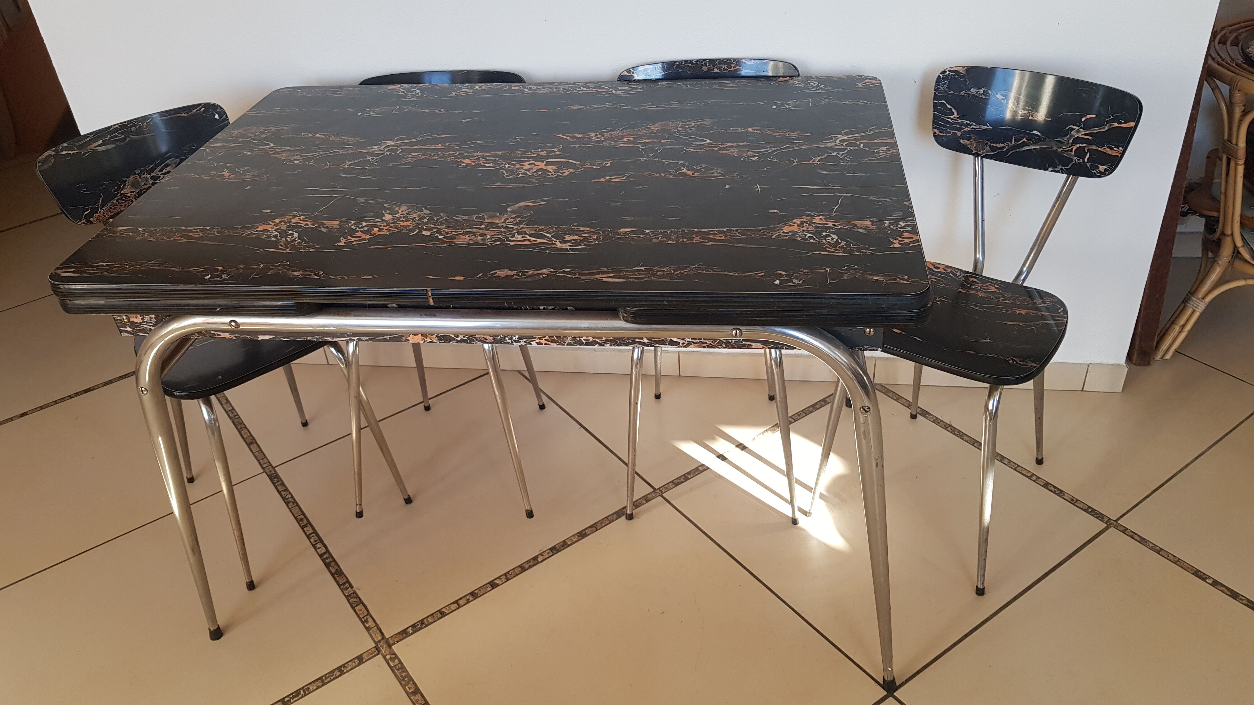 Table and 6 chairs in black formica marble effect