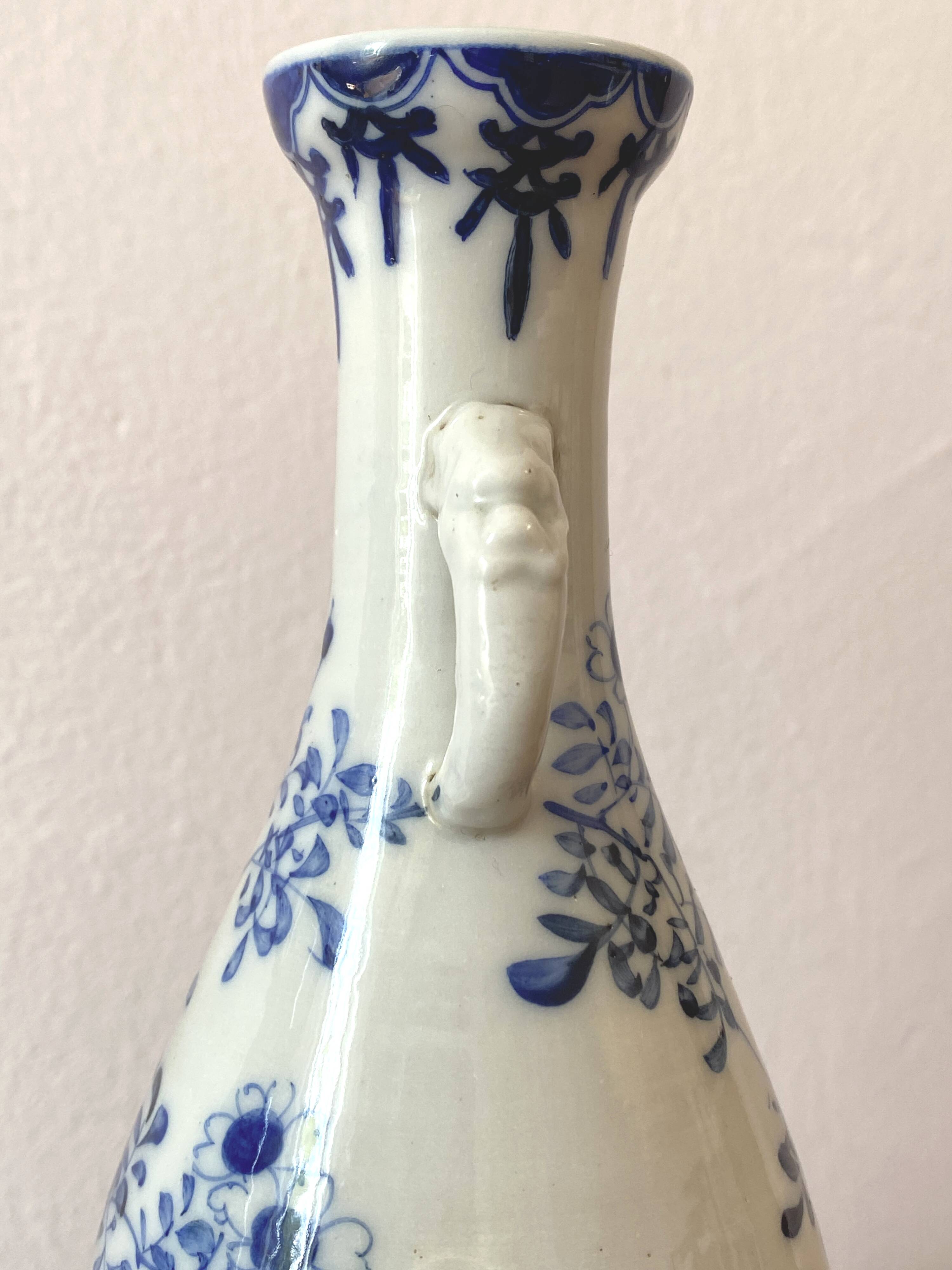 Old pair of blue and white porcelain vases from Japan - in good condition.