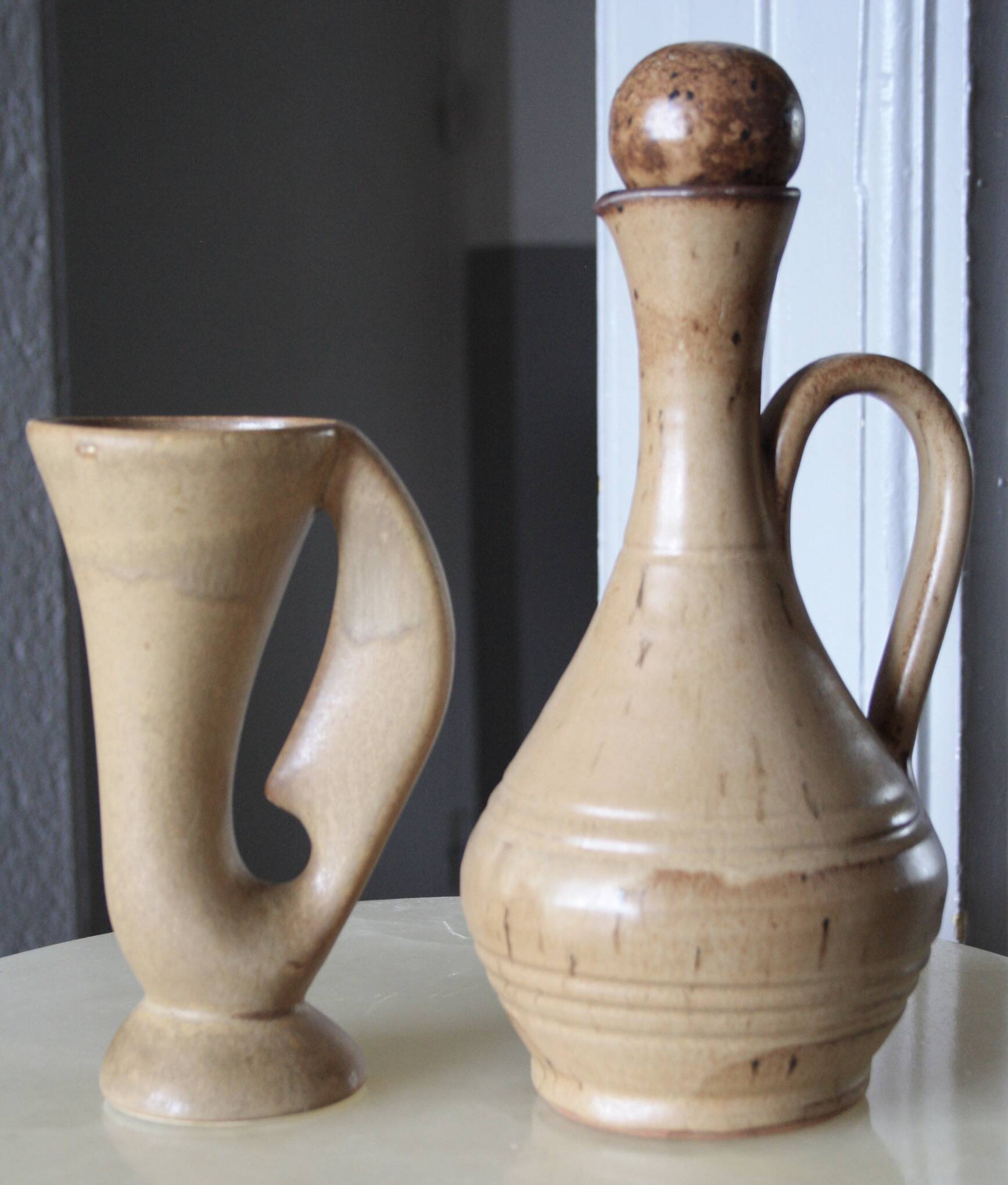 Set of 2 antique stoneware carafes/pitchers