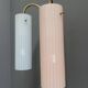 Brass wall lamp with a pink and a blue glass shade 1960s