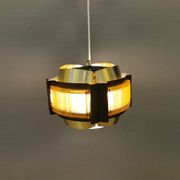 Danish hanging lamp, made in brass colored and brown metal, with yellowish hard pressed plastic deta