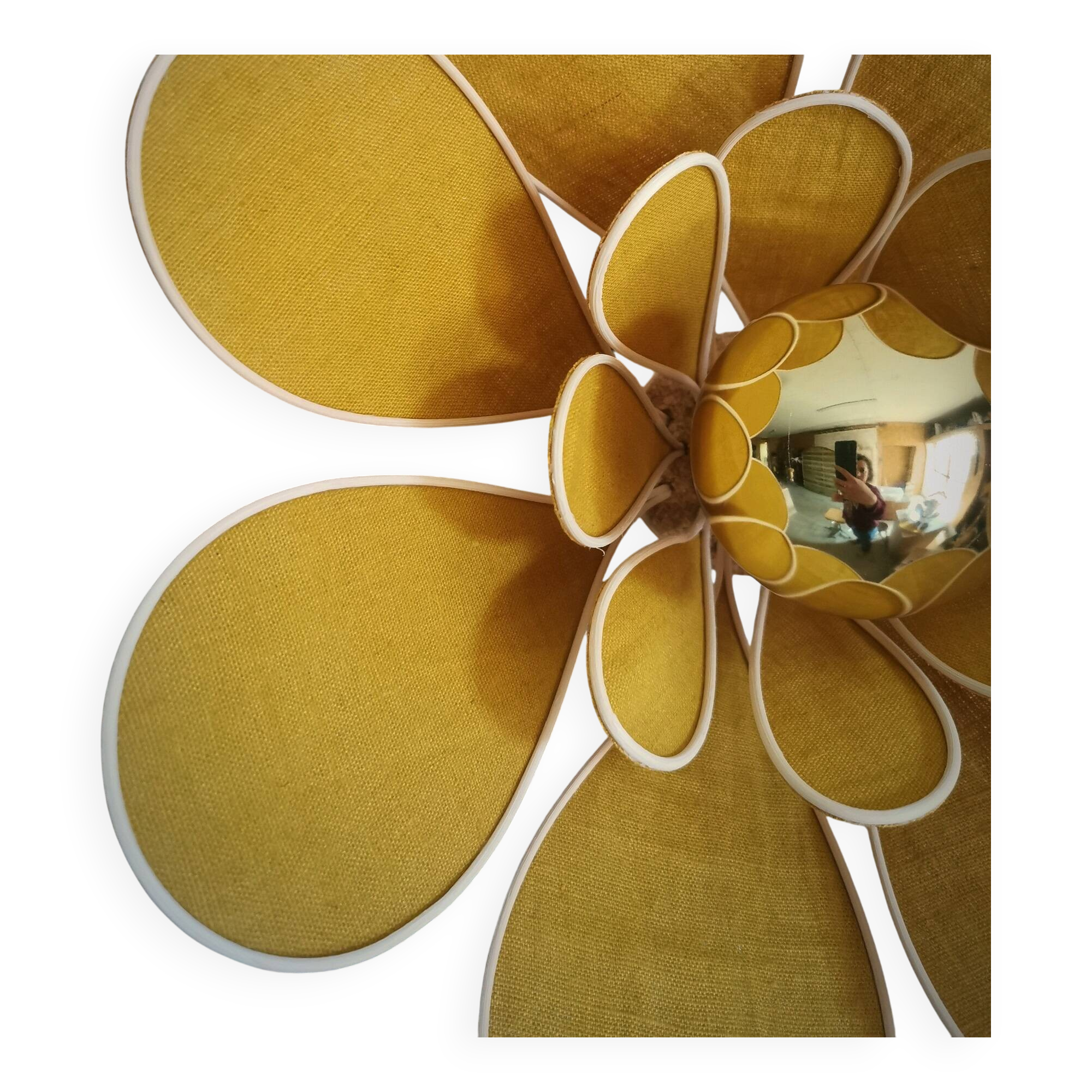 Flower wall light made of rattan and saffron linen petals