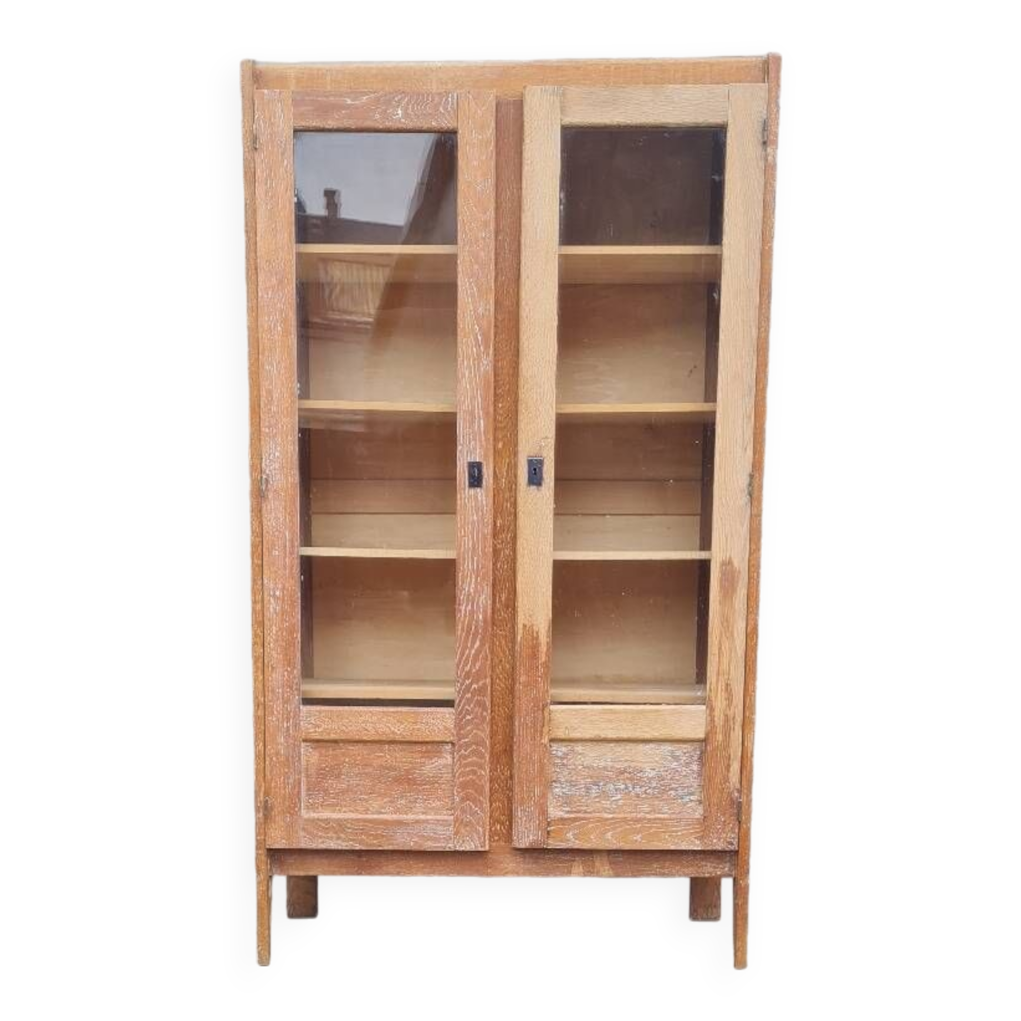 Armoire pied compas en chêne blond