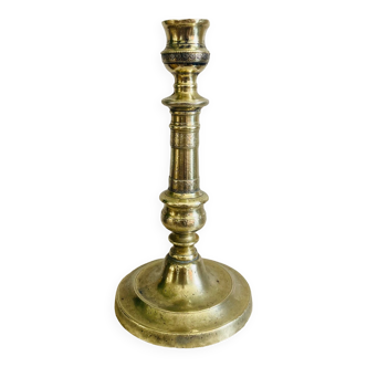 Bronze candlestick from the 19th century or even earlier... chiseled decorations