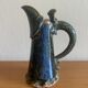 Antique Art Nouveau enamelled stoneware carafe