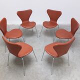'Series 7' chairs in cognac leather by Arne Jacobsen for Fritz Hansen, 1955