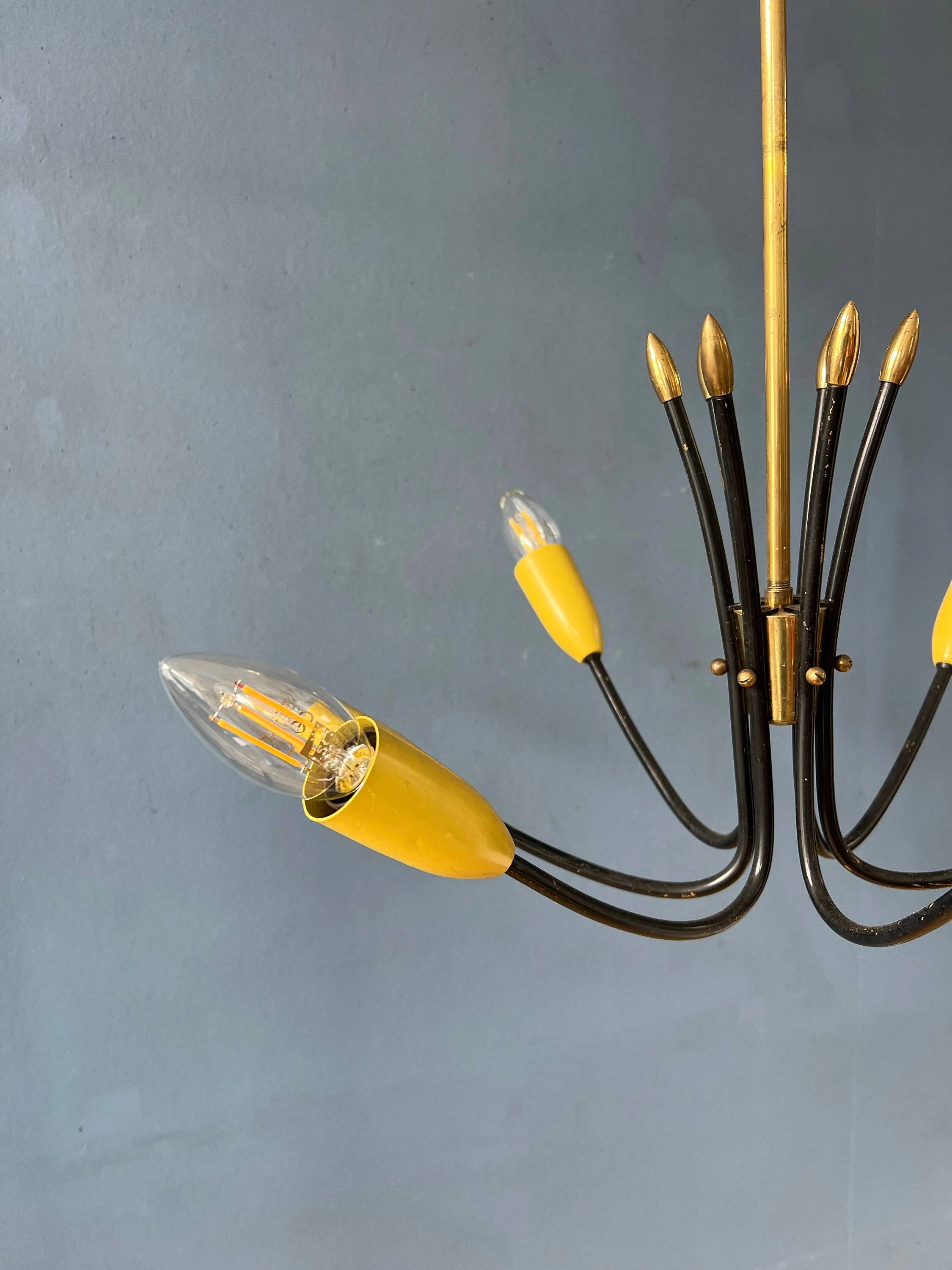 Vintage yellow spider suspension from the 1950s.