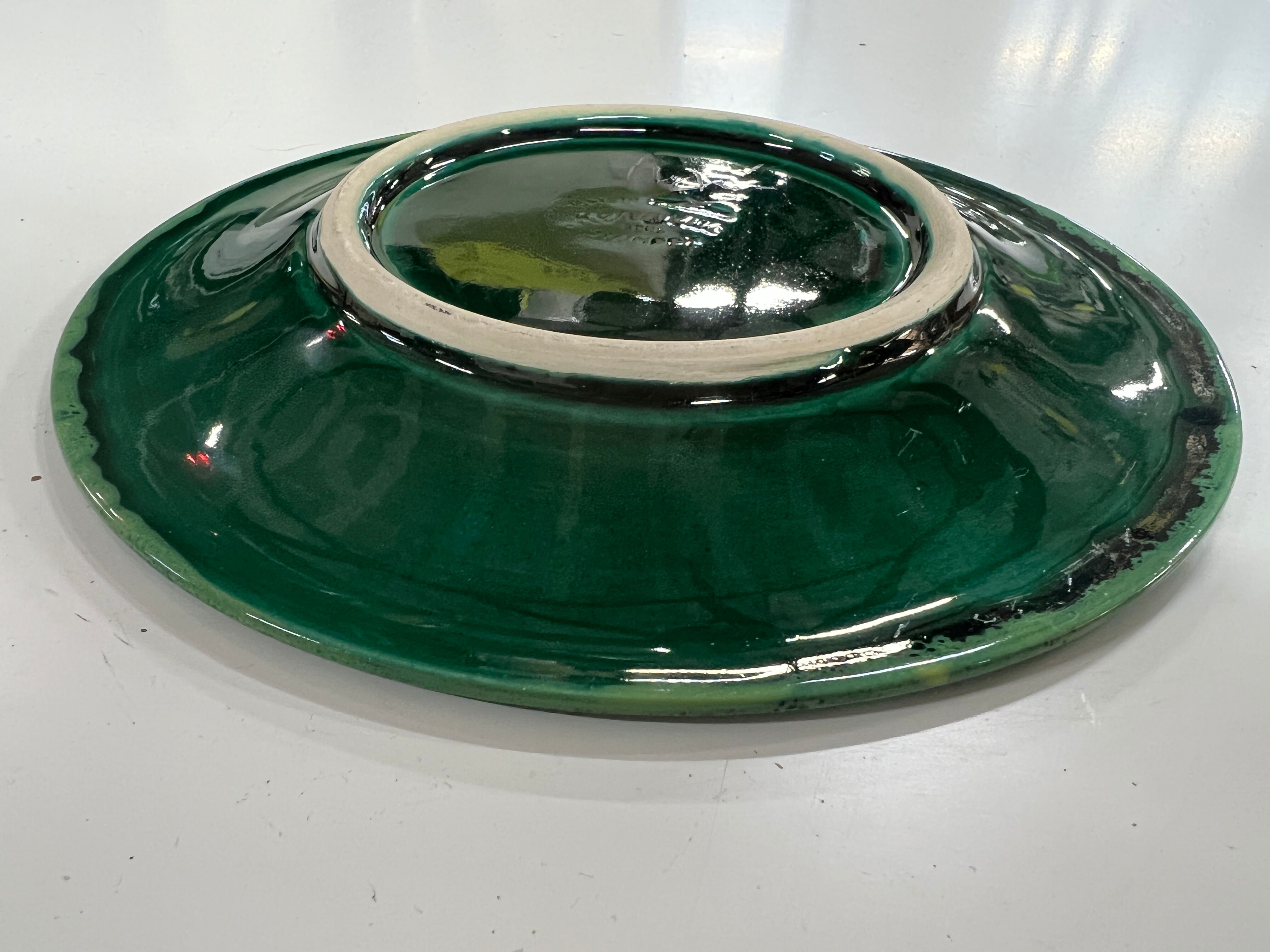 Ceramic plate signed Paul Yvain